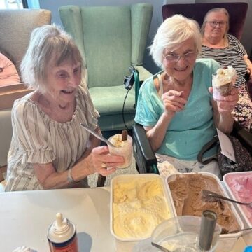 Photo of Residents making Ice Cream Sundaes