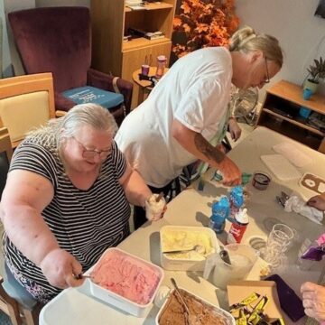 Photo of Residents making Ice Cream Sundaes