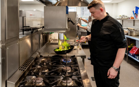 Sean our Head Chef cooking the lunch meal on the stove