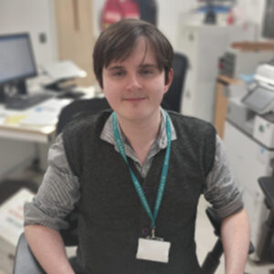 Picture of Patrick at reception desk