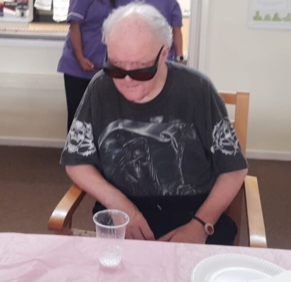Picture of David in a chair