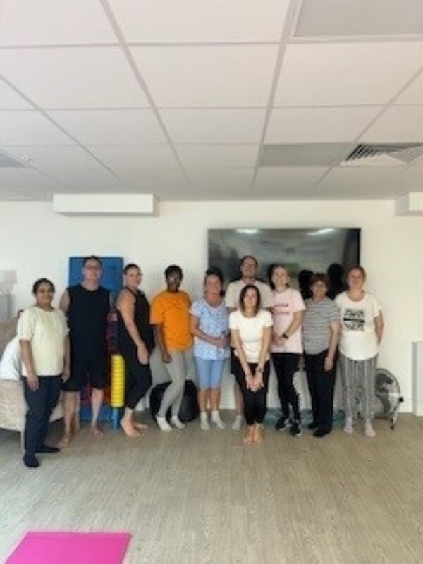 staff with yoga tutor
