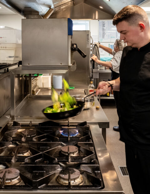 Action Shot of Sean Cooking in BMH Kitchen