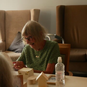 Resident is enjoying an arts and crafts afternoon