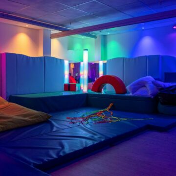 Photo of Sensory Room with soft furnishings and coloured lighting